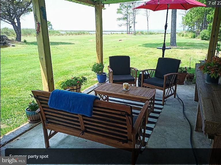 3310 Belfiore Road Church Creek, MD 21622 - Photo 16 of 55 a view of a outdoor sitting area with furniture