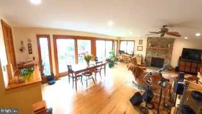 a bedroom with a bed dresser and a window