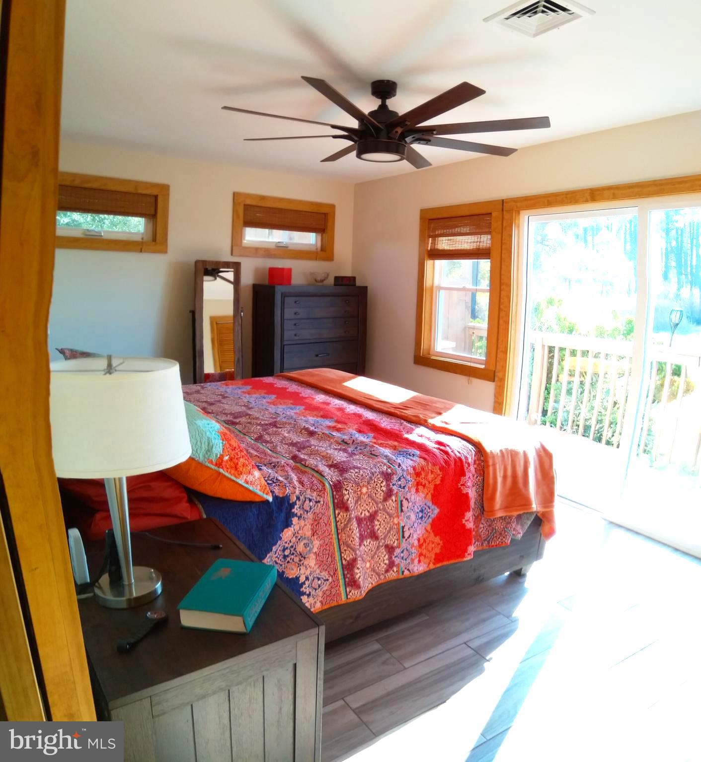 3310 Belfiore Road Church Creek, MD 21622 - Photo 30 of 55 a bedroom with a bed dresser and a window