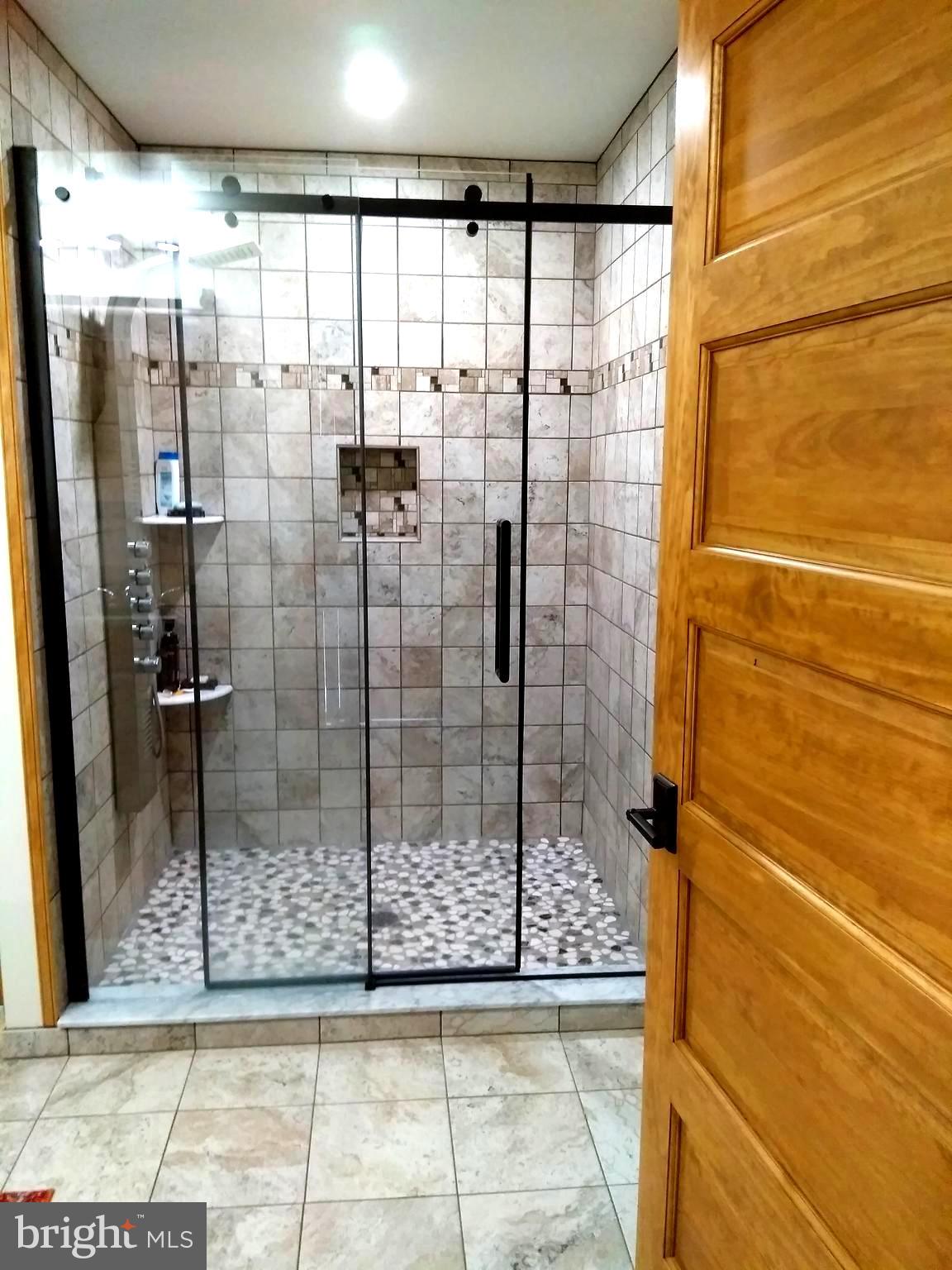 3310 Belfiore Road Church Creek, MD 21622 - Photo 32 of 55 a bathroom with a shower