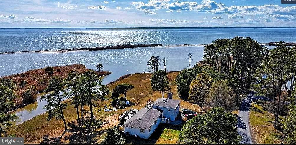 3310 Belfiore Road Church Creek, MD 21622 - Photo 40 of 55 a view of a lake with a mountain