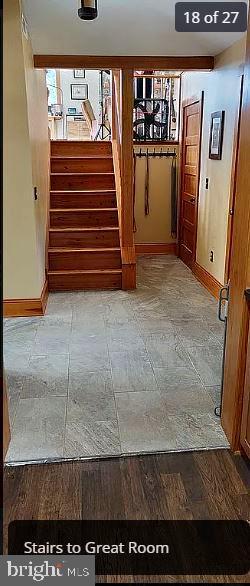 3310 Belfiore Road Church Creek, MD 21622 - Photo 43 of 55 a view of a hallway with wooden walls and stairs