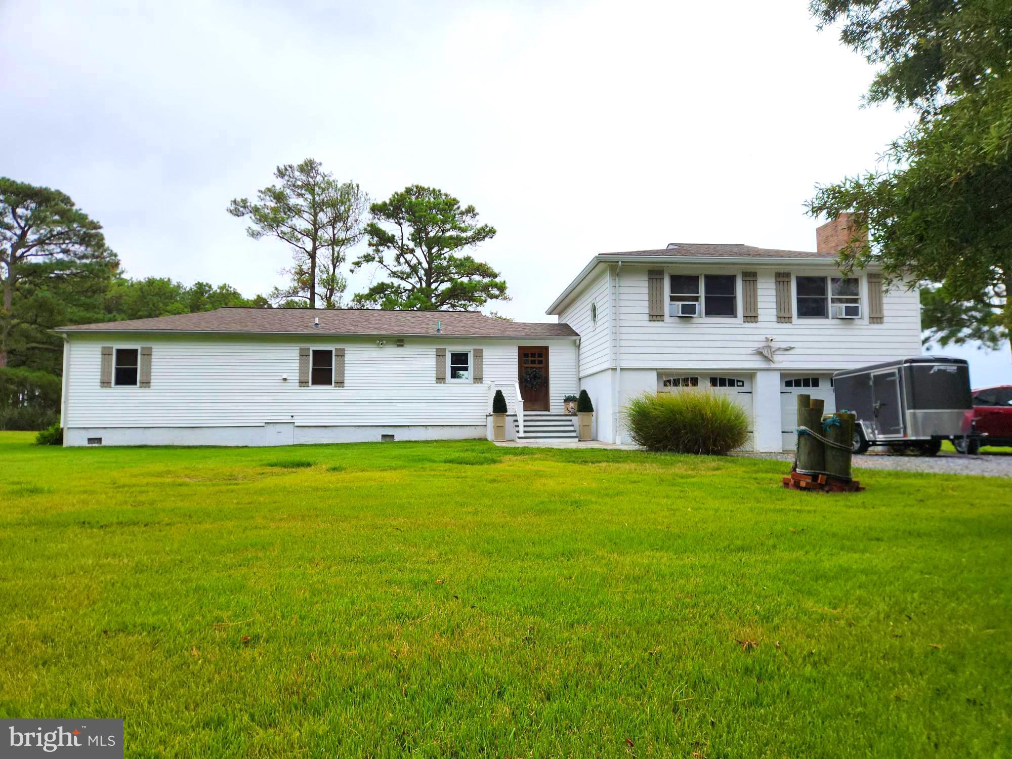 3310 Belfiore Road Church Creek, MD 21622 - Photo 48 of 55 a front view of a house with garden