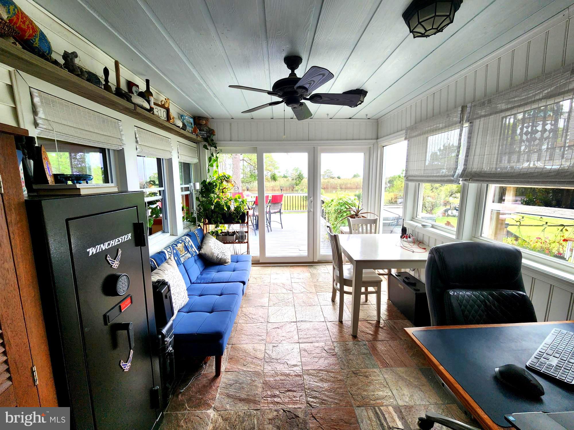 3310 Belfiore Road Church Creek, MD 21622 - Photo 55 of 55 a living room with furniture and a large window
