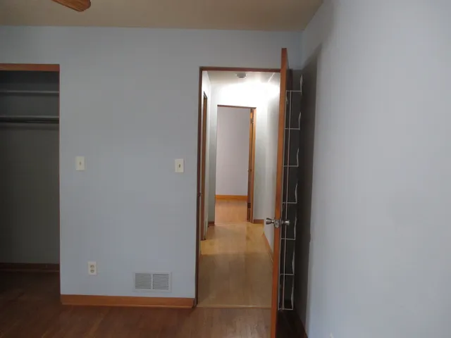 a view of a bathroom with a glass door