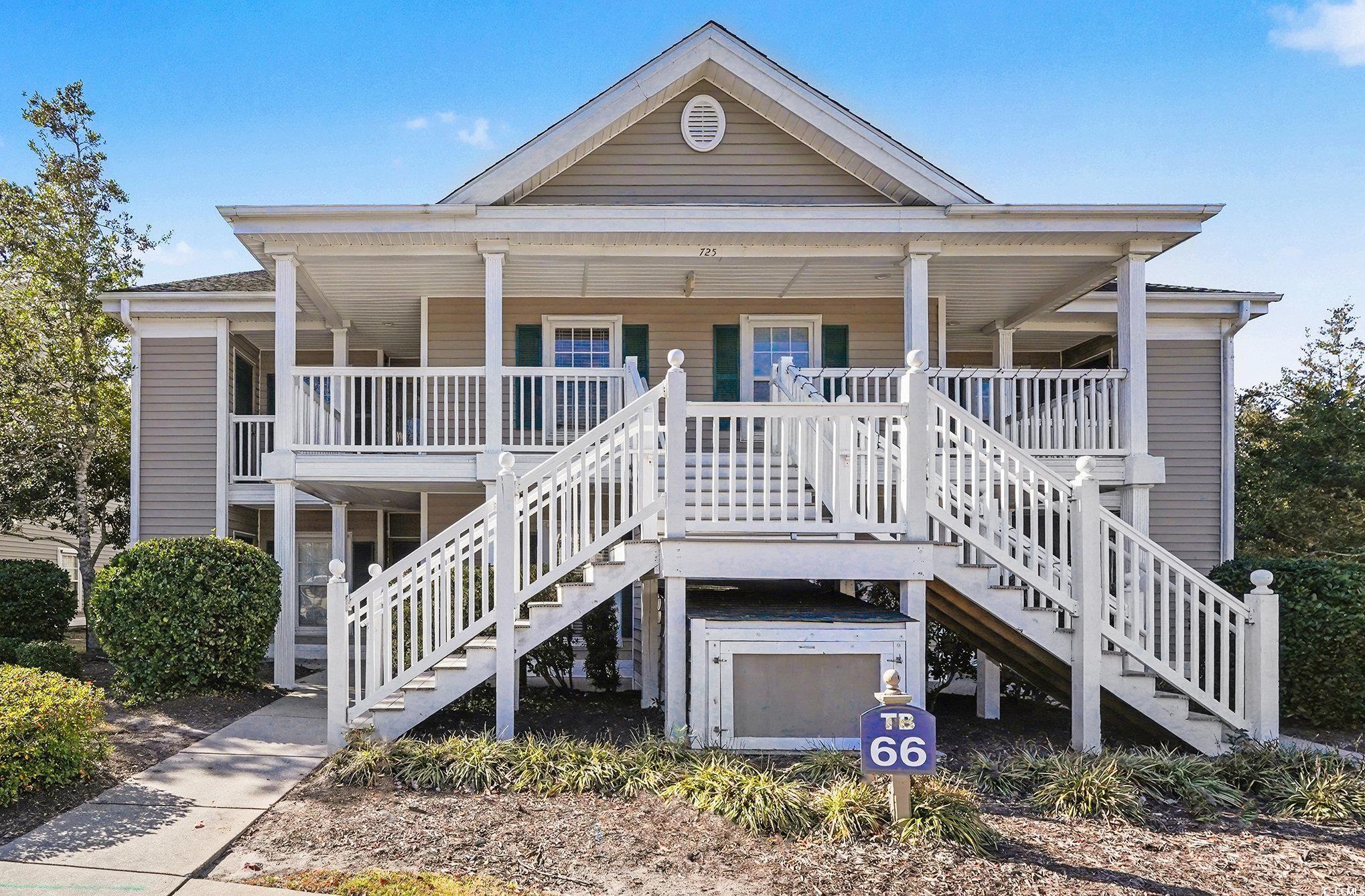 725 Blue Stem Drive, Unit 66B Pawleys Island, SC 29585 - Photo 2 of 30 View of front of property with a porch and stairs