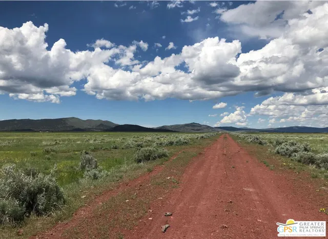 a view of lake with mountain in the background