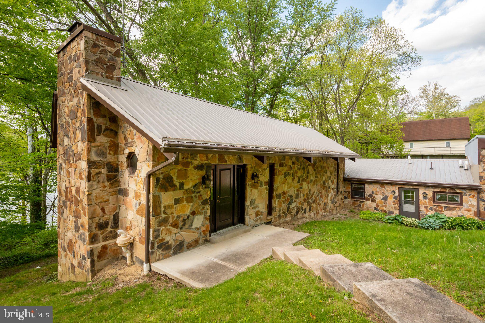 750 Lake Side Road Addison, PA 15411 - Photo 6 of 51 Charming stone cottage by the lake.