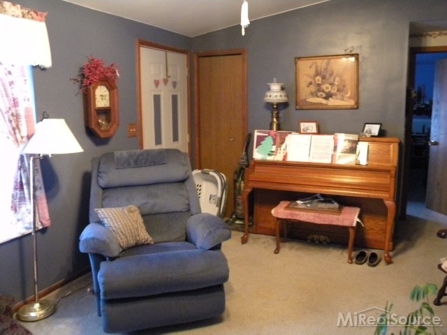 13219 Tibbets Road Memphis, MI 48041 - Photo 5 of 21 This is another view of the living room.