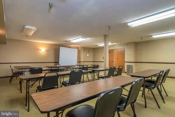 a view of a a dining room with furniture