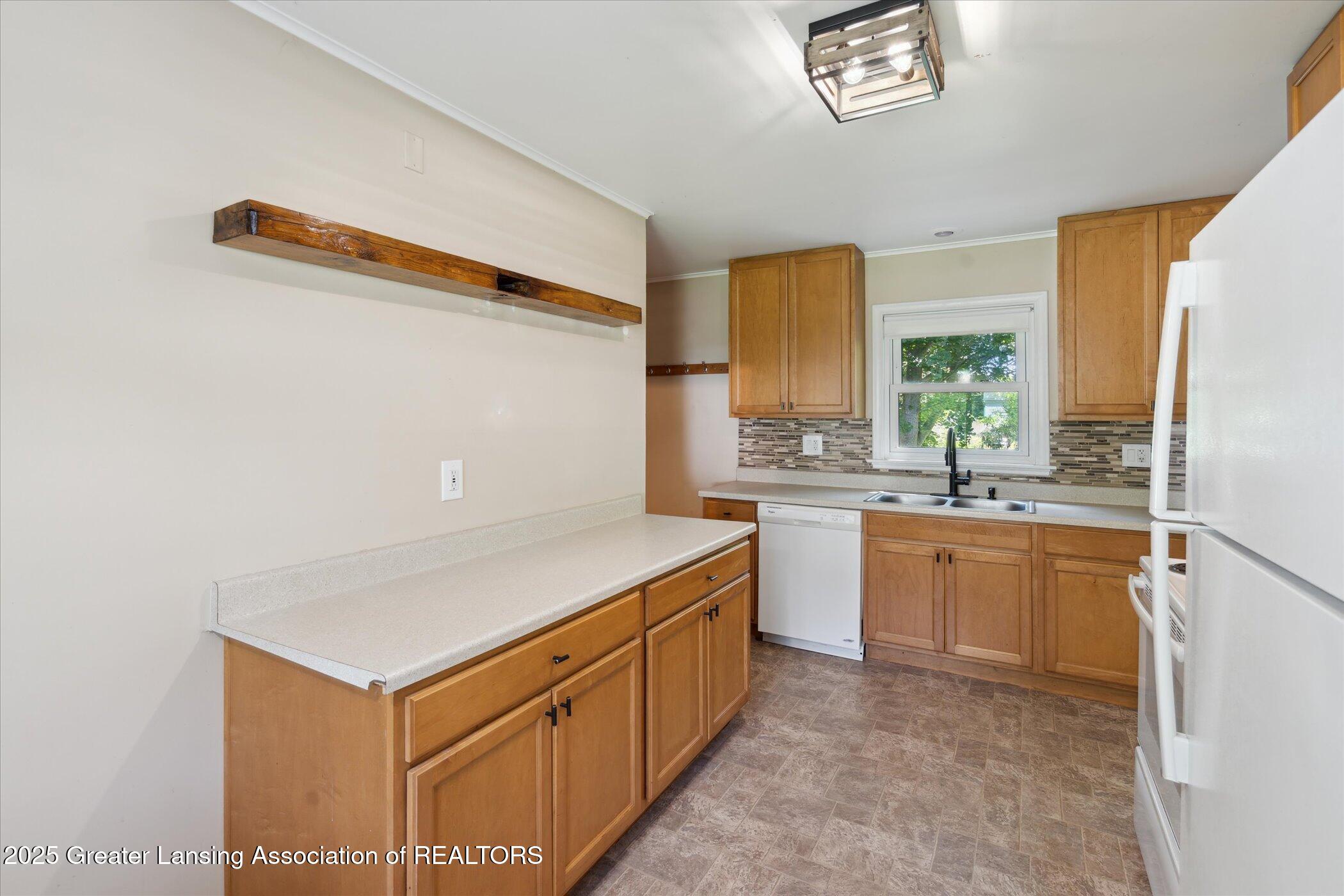 808 Robins Road Lansing, MI 48917 - Photo 13 of 38 13-808-Robins-Rd-Lansing-MI-48917-Window