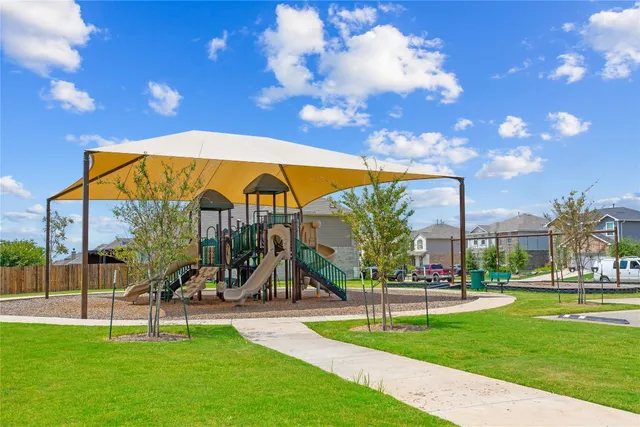 a view of a golf course with a garden