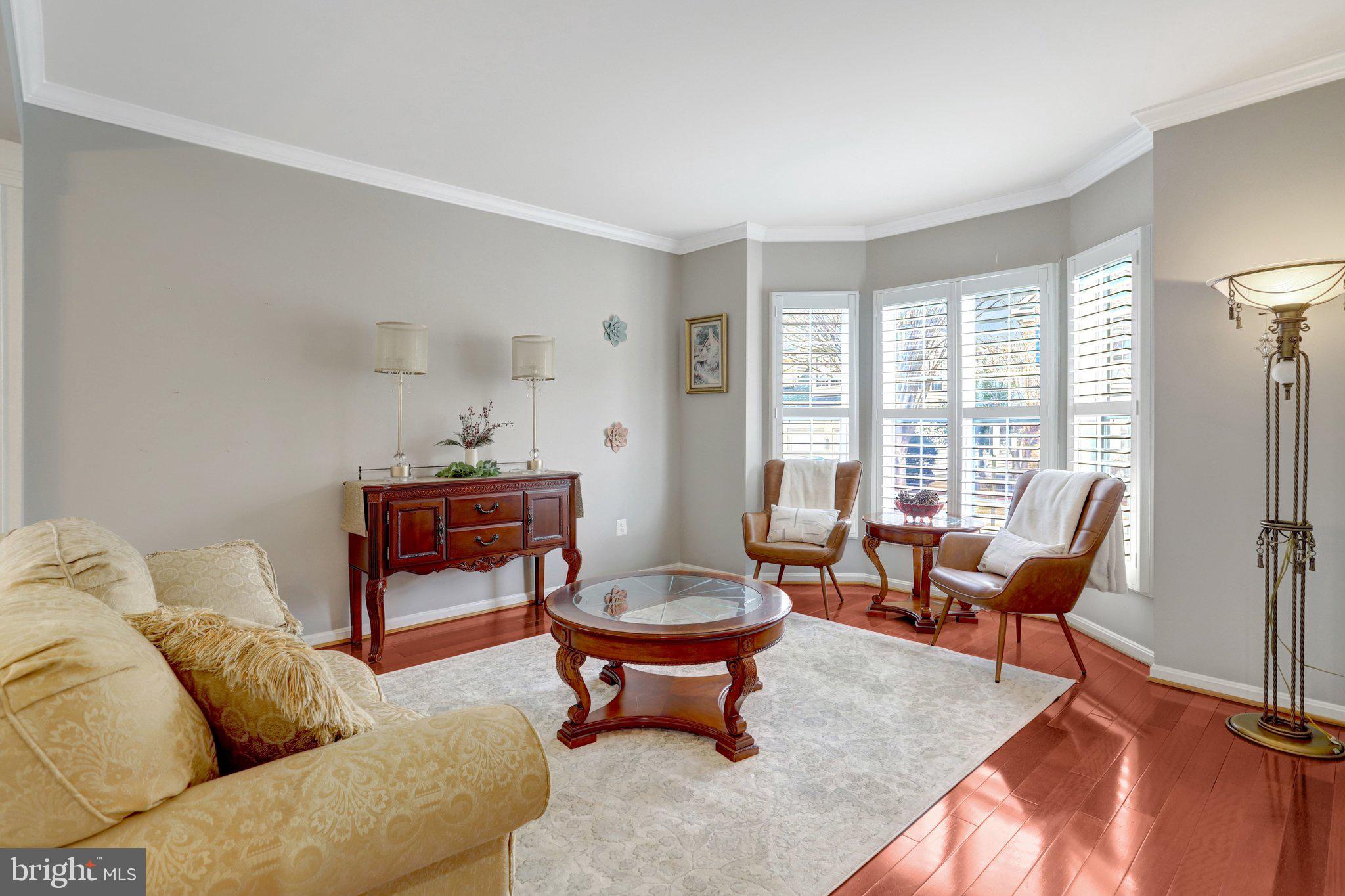 7374 Pohick Ridge Court Springfield, VA 22153 - Photo 12 of 58 a living room with furniture a window and a couch