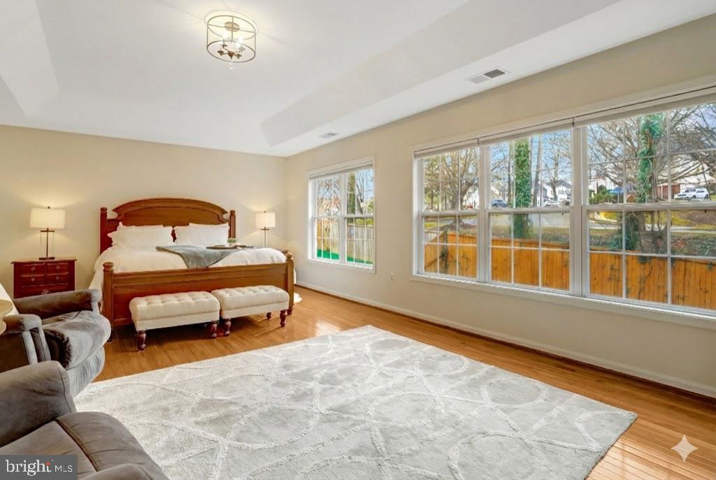 7374 Pohick Ridge Court Springfield, VA 22153 - Photo 18 of 58 a bedroom with furniture and a large window