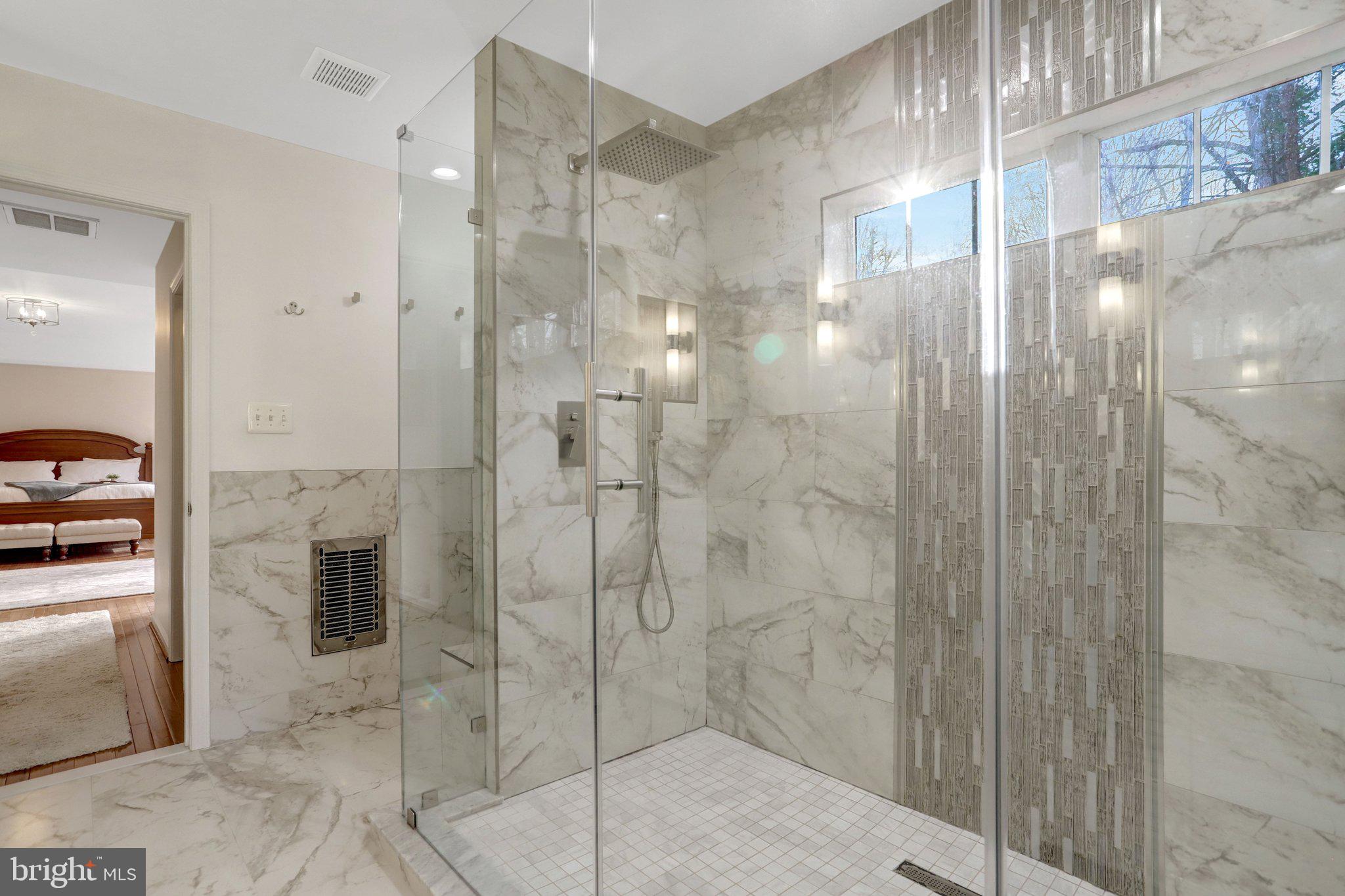 7374 Pohick Ridge Court Springfield, VA 22153 - Photo 24 of 58 a bathroom with a shower and a sink