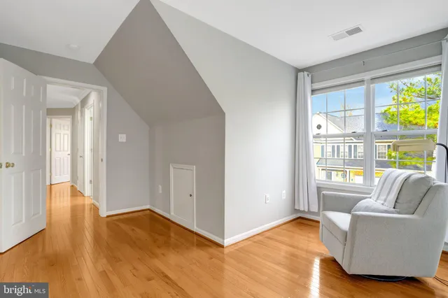 a room with a sink and a window