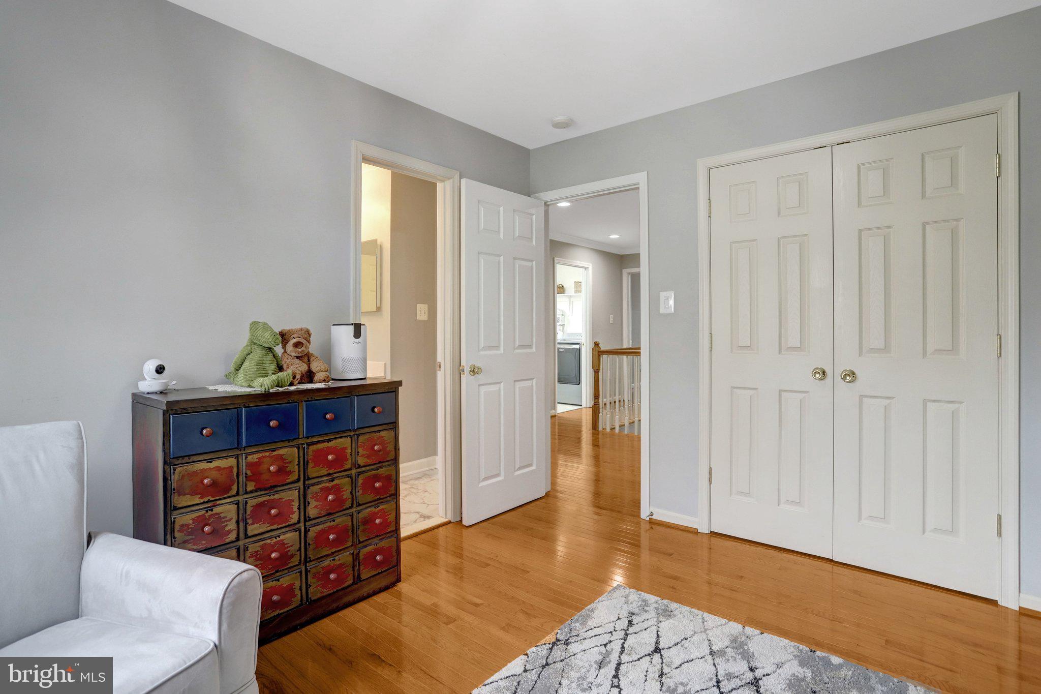 7374 Pohick Ridge Court Springfield, VA 22153 - Photo 38 of 58 a view of room with furniture and wooden floor