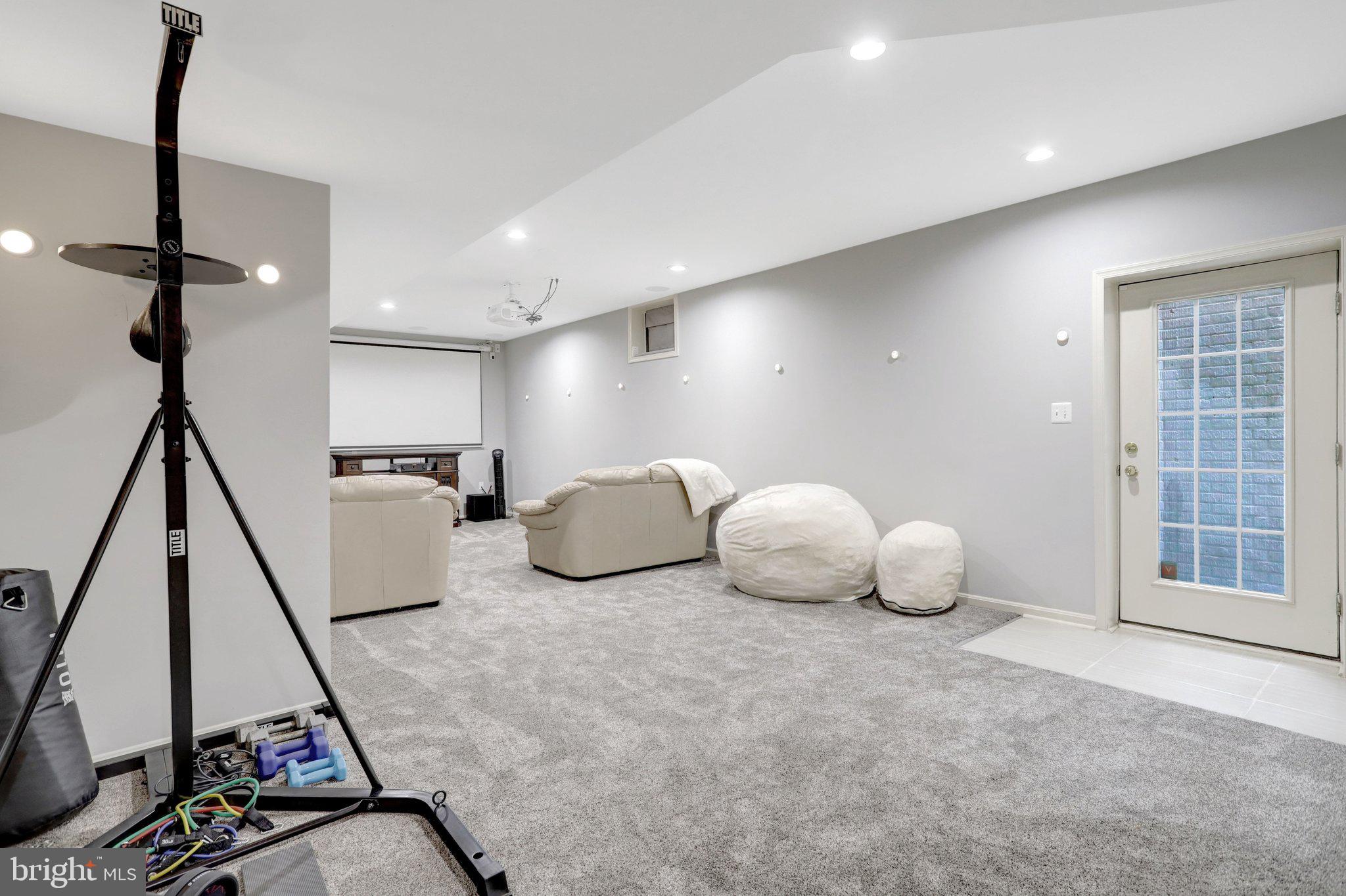 7374 Pohick Ridge Court Springfield, VA 22153 - Photo 42 of 58 a living room with furniture and a window