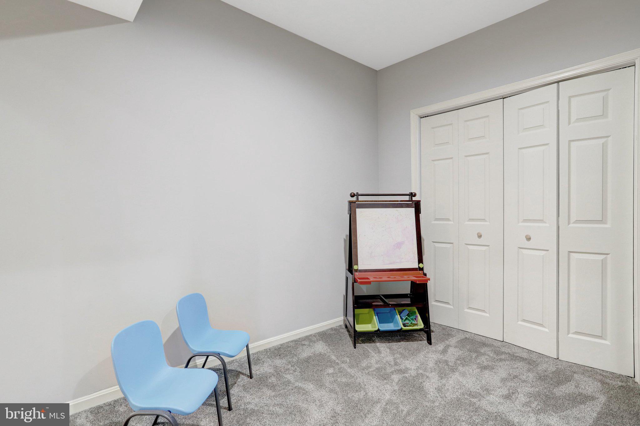 7374 Pohick Ridge Court Springfield, VA 22153 - Photo 48 of 58 a room with a chair