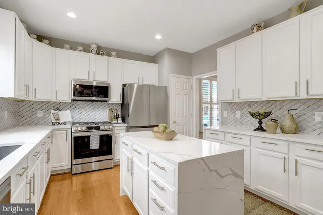 a living room with furniture a window and a couch