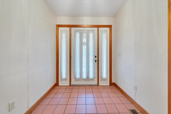a view of an empty room with window