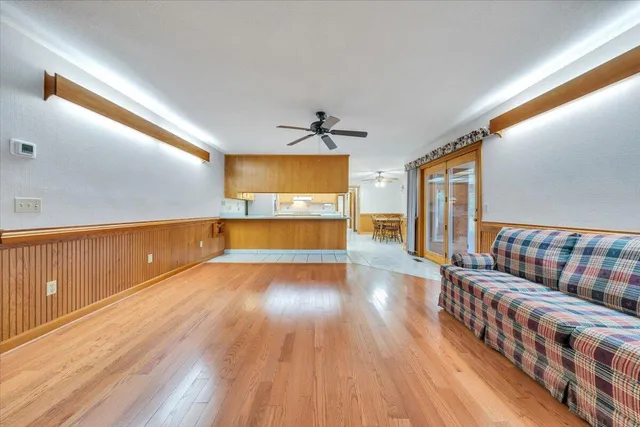 a view of a porch with furniture and yard