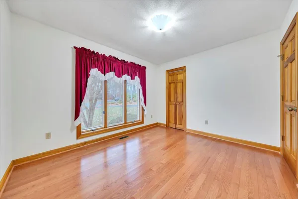 a view of an empty room with window