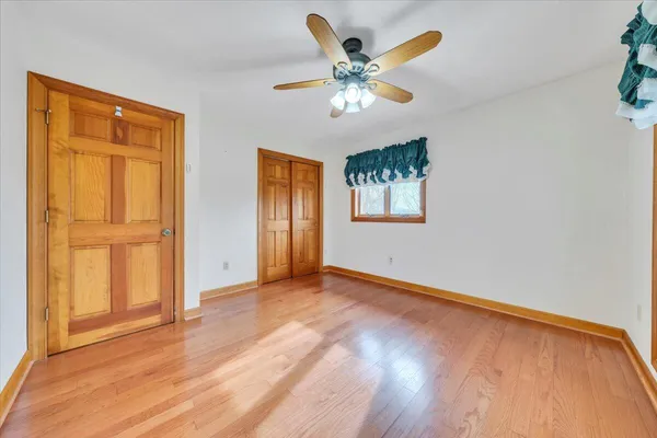 a view of a room with air conditioner duct and materials on floor