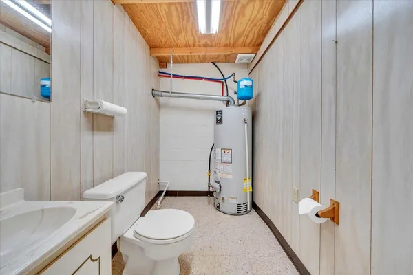 a picture of a bathroom with a shower