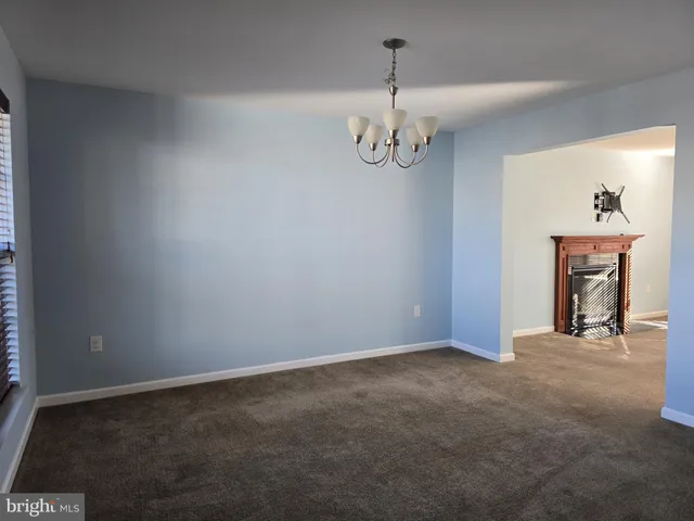 a view of a room with a chandelier