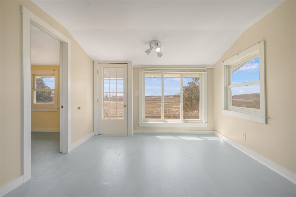 7 Shawmut Street Fairhaven, MA 02719 - Photo 14 of 39 a view of an empty room with a window