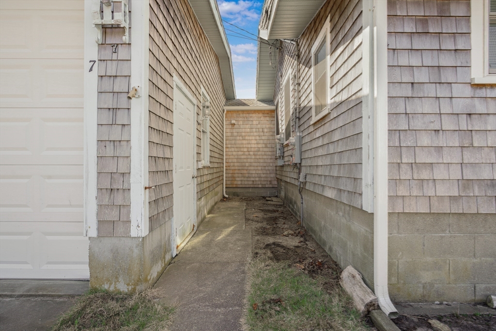 7 Shawmut Street Fairhaven, MA 02719 - Photo 25 of 39 a view of a pathway along the building