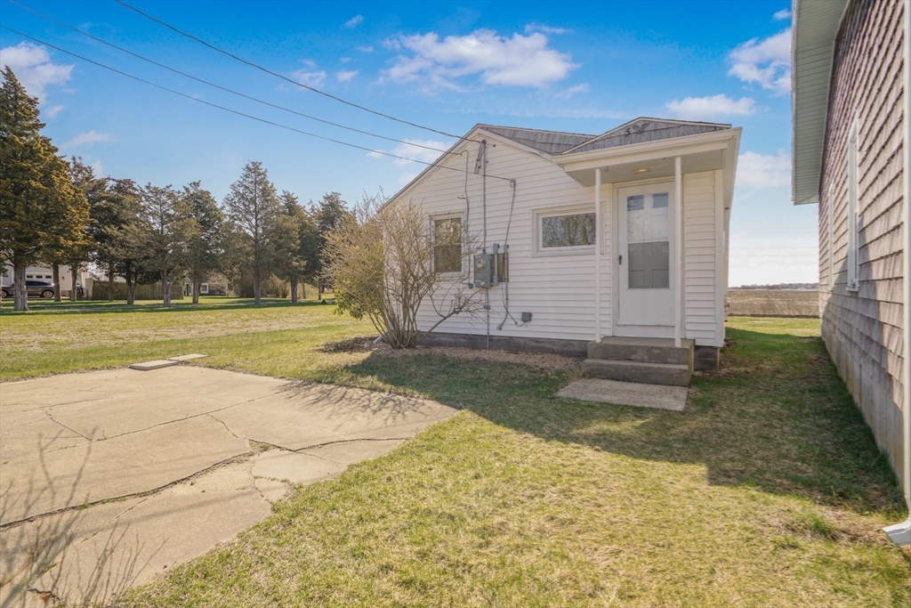 7 Shawmut Street Fairhaven, MA 02719 - Photo 26 of 39 a view of a house with backyard and trees