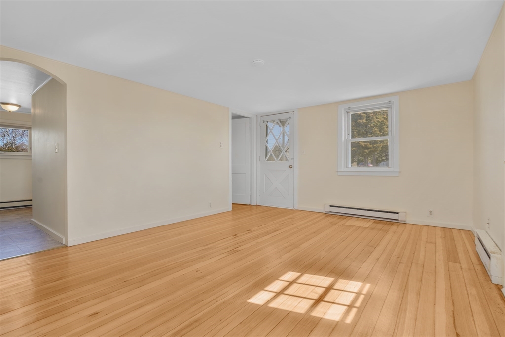 7 Shawmut Street Fairhaven, MA 02719 - Photo 30 of 39 a view of an empty room and wooden floor