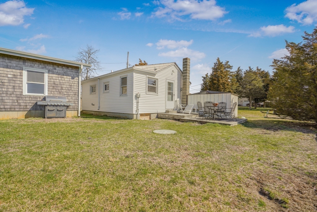 7 Shawmut Street Fairhaven, MA 02719 - Photo 33 of 39 a view of a house with a yard