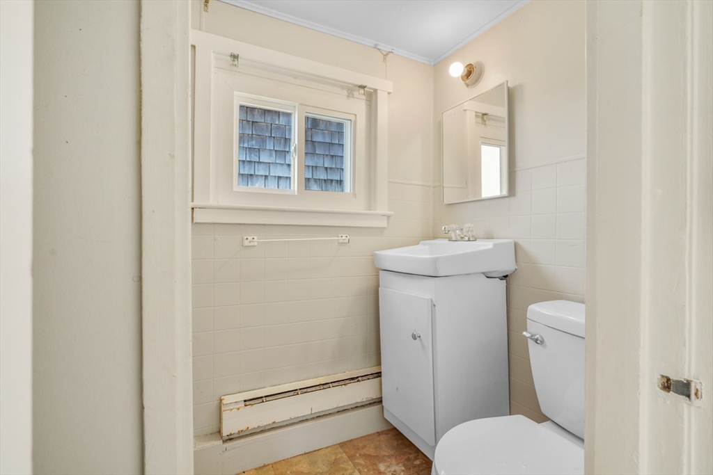 7 Shawmut Street Fairhaven, MA 02719 - Photo 39 of 39 a bathroom with a toilet and a sink