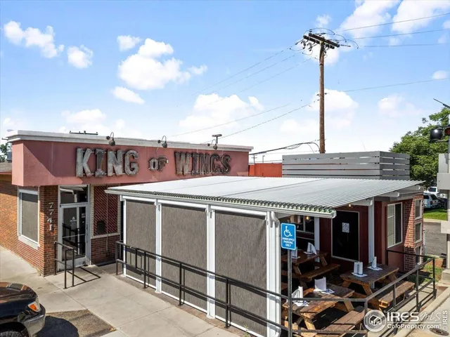 a front view of a building with street