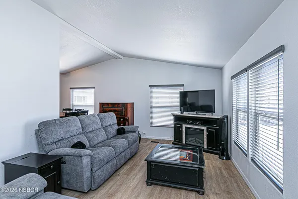 a living room with furniture and a couch