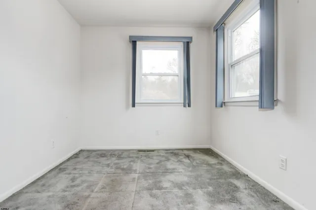 a bathroom with a toilet a sink a bath tub and shower
