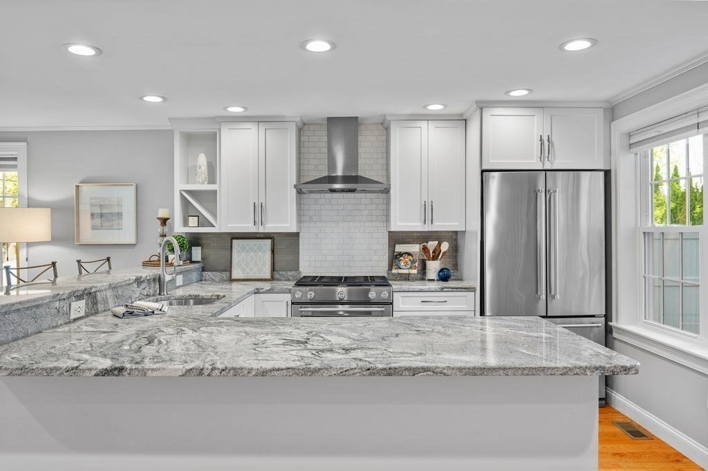 27 Warren Street, Unit 1 Newburyport, MA 01950 - Photo 14 of 32 a view of kitchen island a sink stainless steel appliances kitchen island