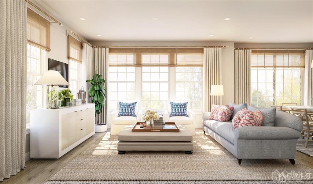 730 Station Road, Unit 513 Dunellen, NJ 08812 - Photo 1 of 6 a living room with furniture and large windows