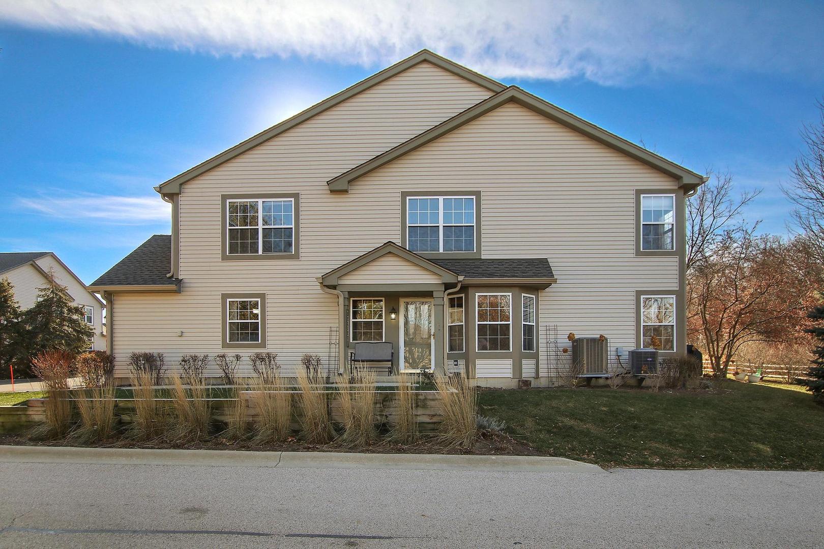 521 Willow Way Lindenhurst, IL 60046 - Photo 23 of 24 a front view of a house with a yard