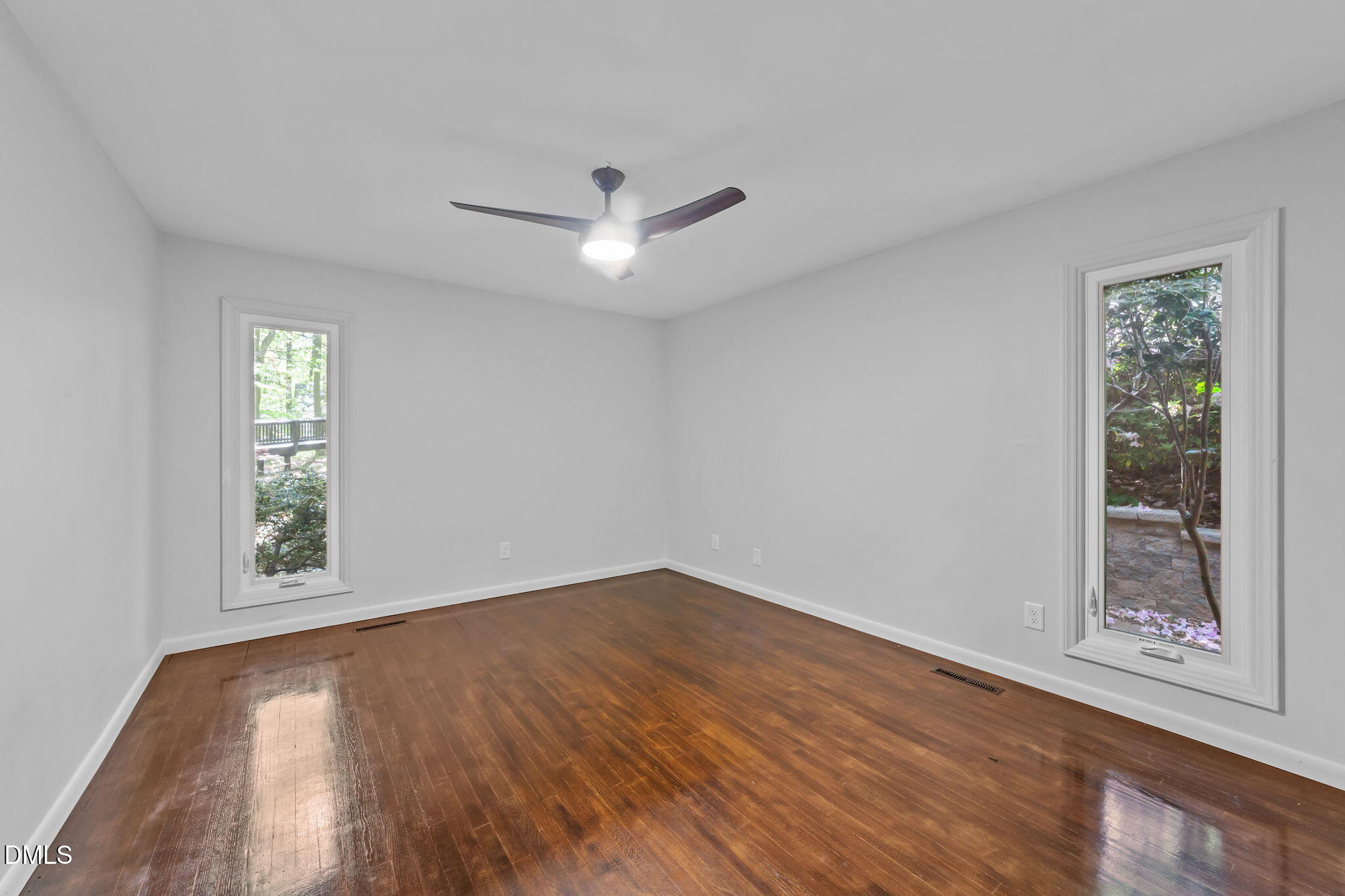 105 Barcliff Terrace Cary, NC 27518 - Photo 25 of 47 wooden floor in an empty room with a window