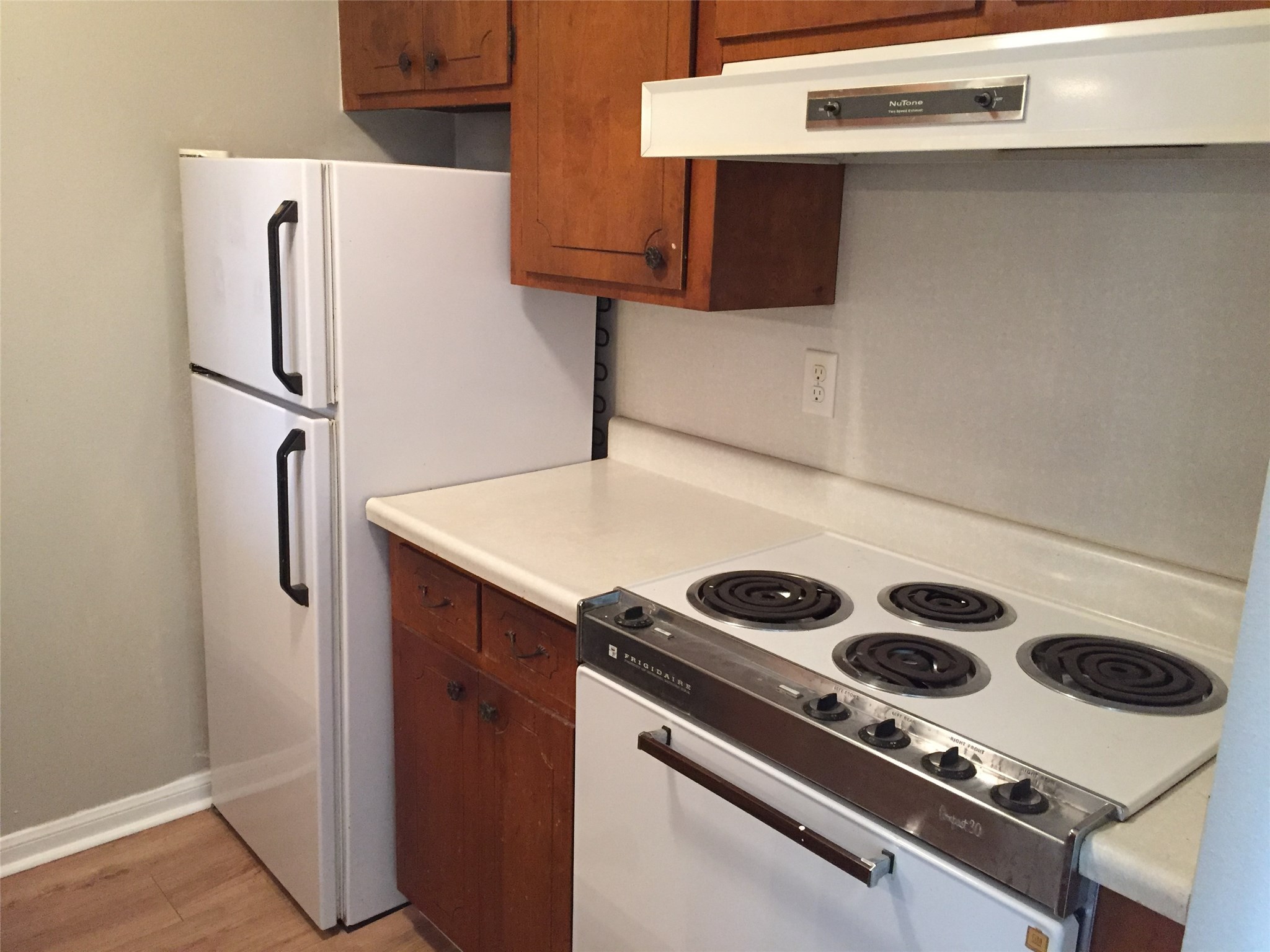 1500 Woodhead Street, Unit 2 Houston, TX 77019 - Photo 12 of 20 a kitchen with a stove and a refrigerator
