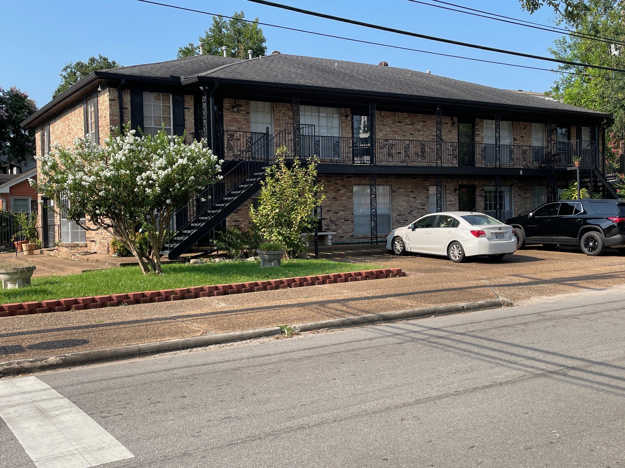 1500 Woodhead Street, Unit 2 Houston, TX 77019 - Photo 2 of 20 a car parked in front of a building
