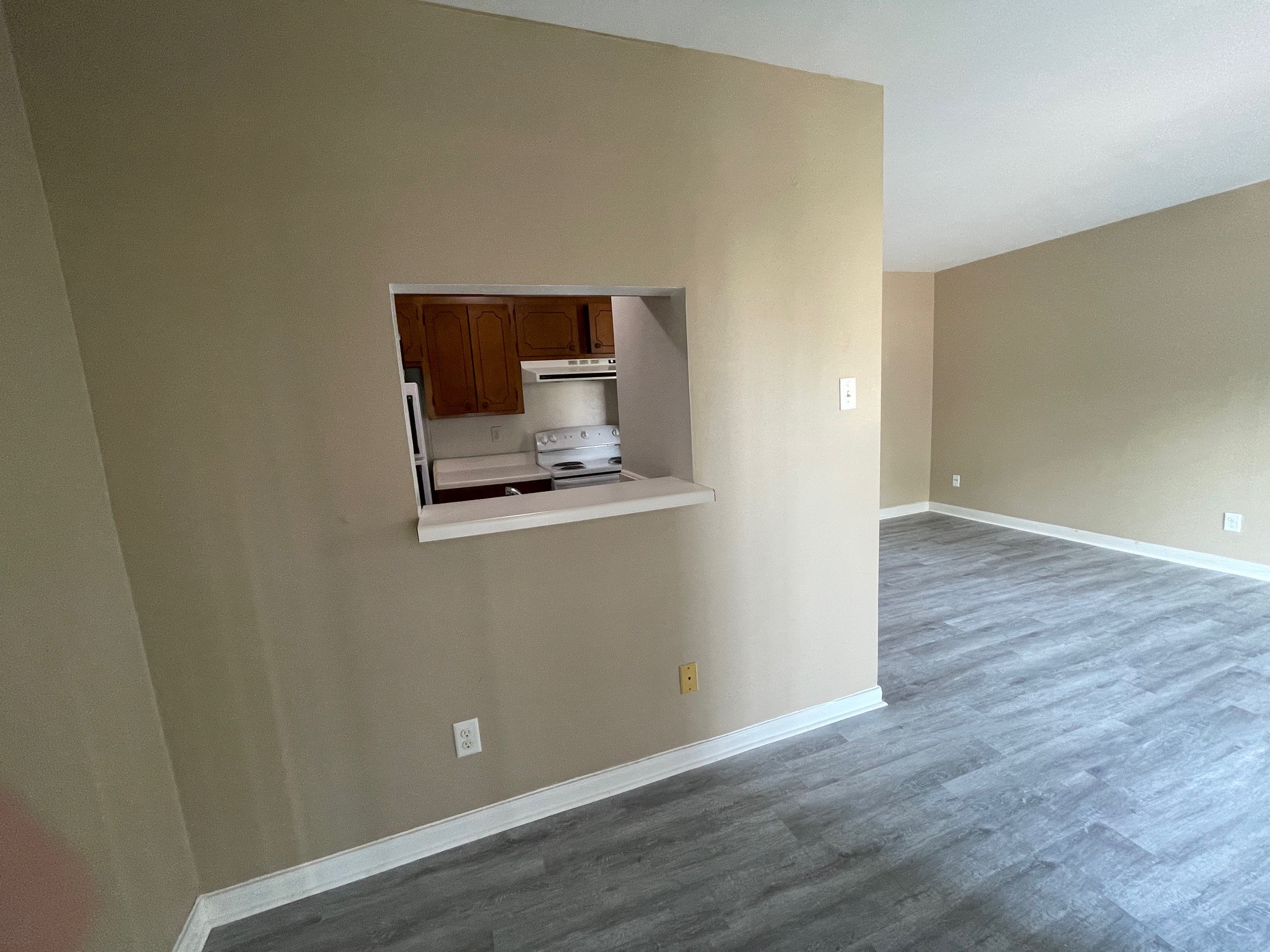 1500 Woodhead Street, Unit 2 Houston, TX 77019 - Photo 9 of 20 a view of an empty room with wooden floor and a window