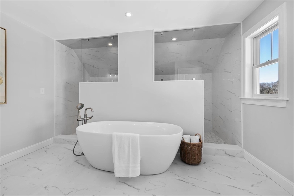 Lot 6 Osprey Court Rowley, MA 01969 - Photo 20 of 25 a white bath tub sitting in a bathroom