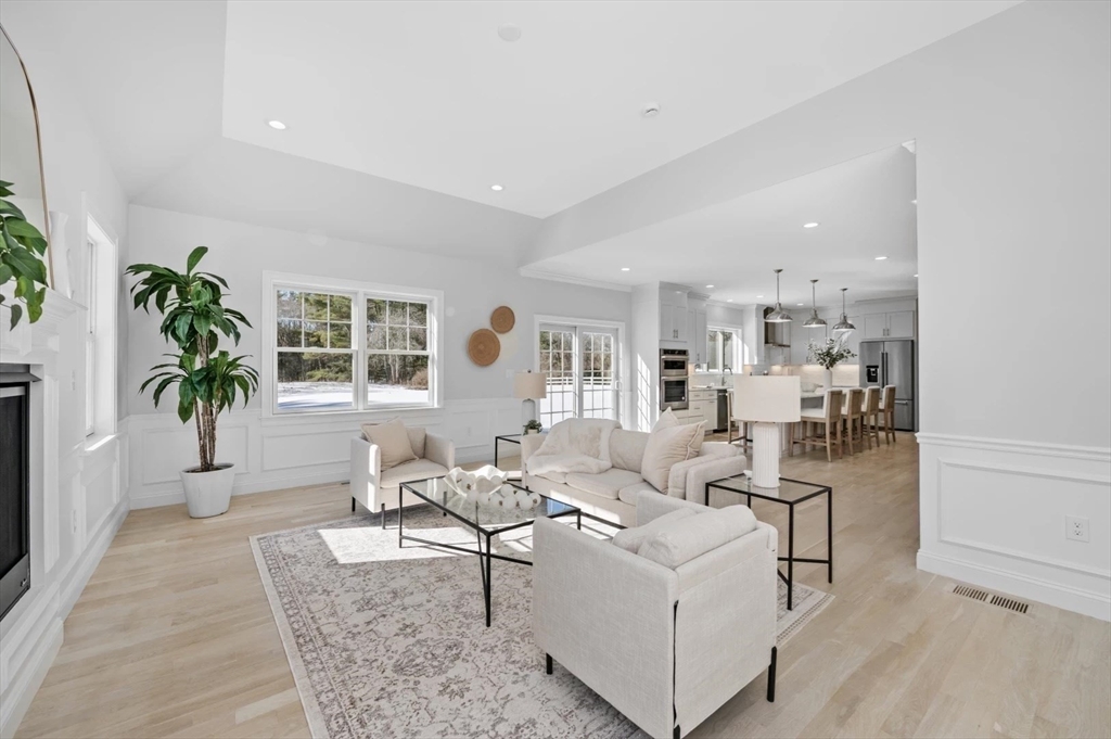 Lot 6 Osprey Court Rowley, MA 01969 - Photo 5 of 25 a living room with furniture and a potted plant