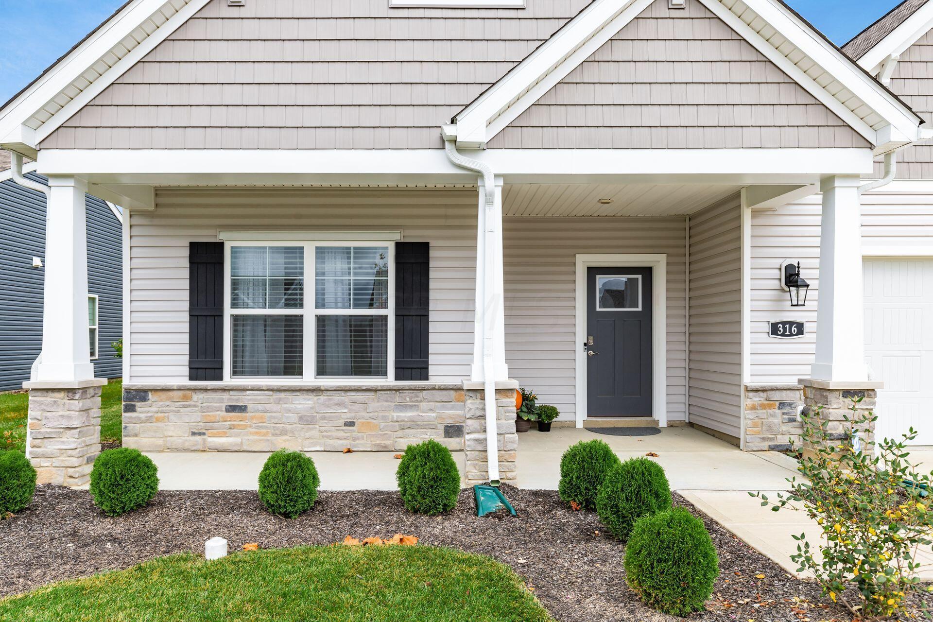 316 Blue Ridge Ostrander, OH 43061 - Photo 2 of 28 Covered Front Porch