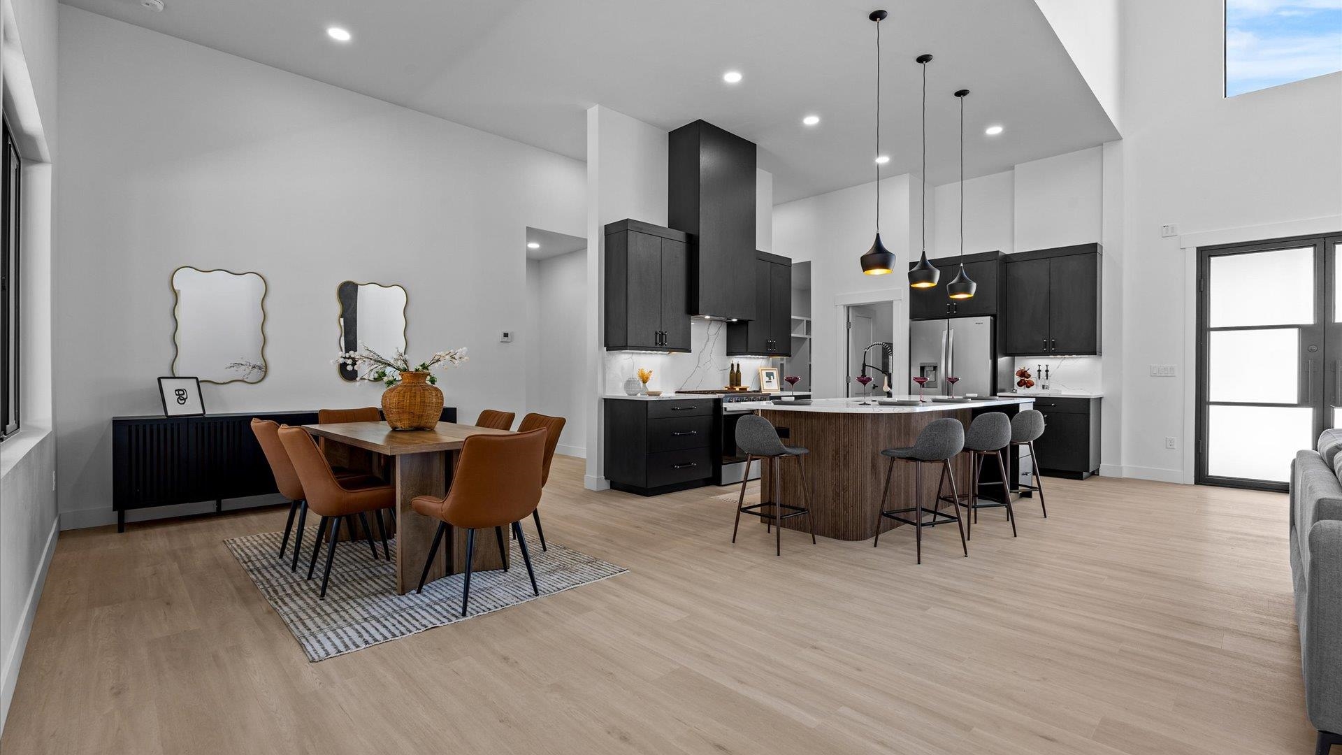 2045 Caleb Street Grand Junction, CO 81507 - Photo 10 of 42 a view of a dining room with furniture and wooden floor